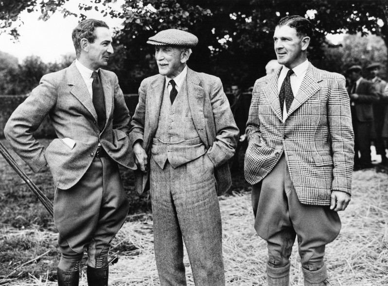 J.C.Robinson talking to his son Harris on his right, and Henry on his left